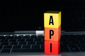 red, orange, yellow cubes, and API letters Or application programming interface